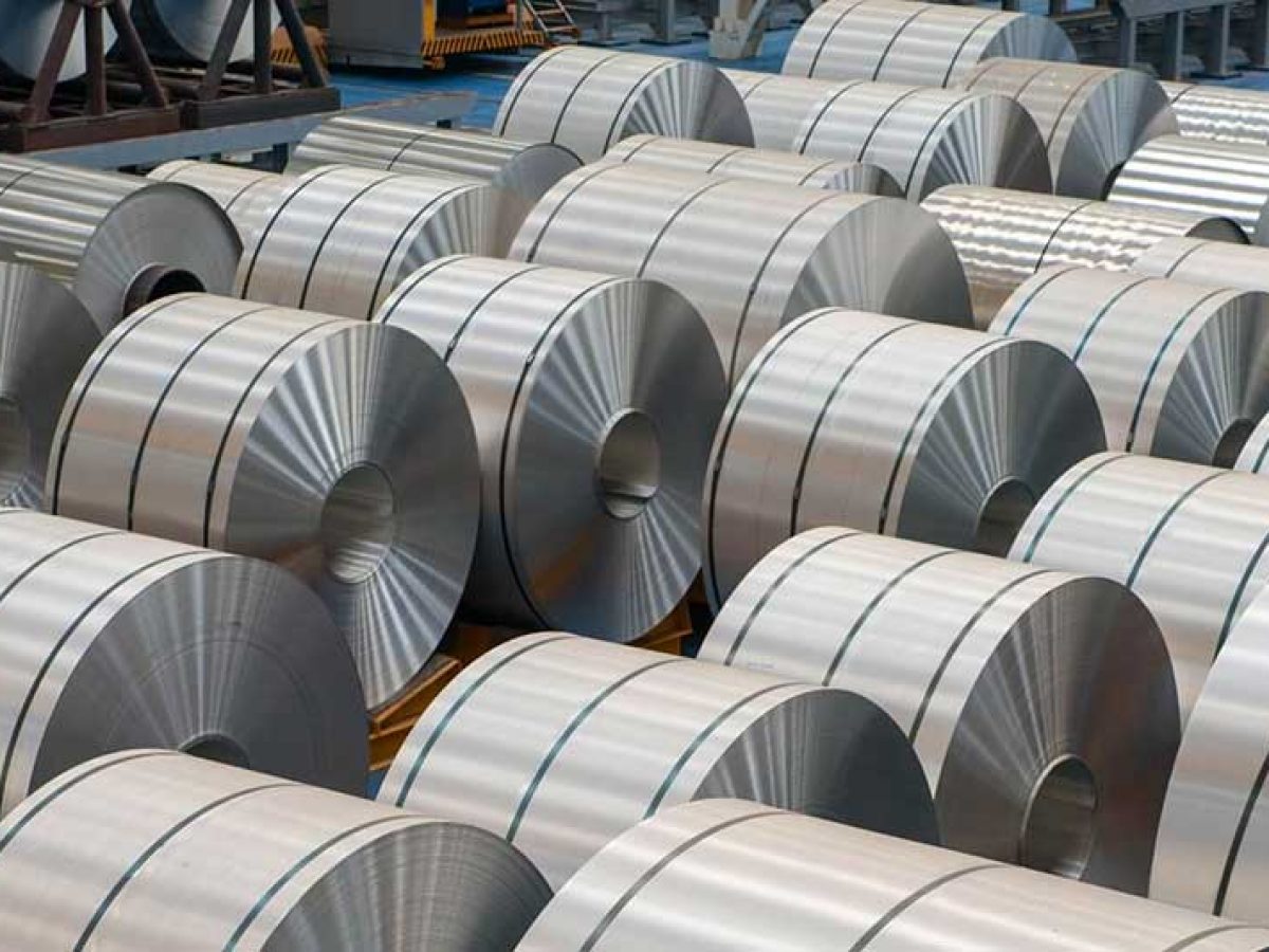 Steel coils stacked in a trading yard